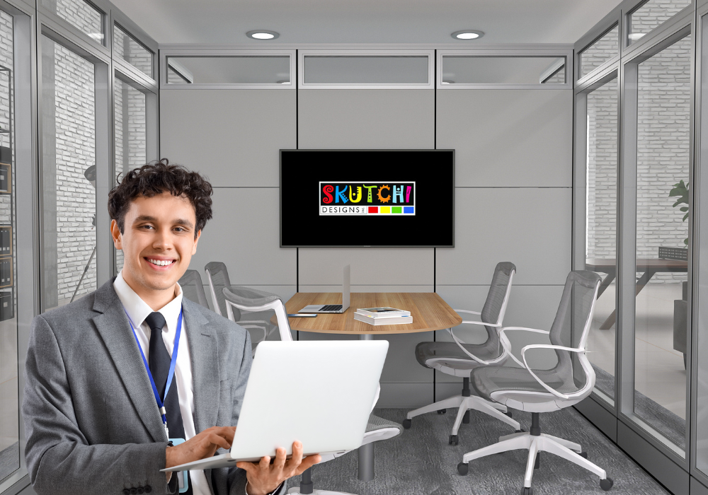 Skutchi workspace specialist inside a modular cubicle during an office design consultation