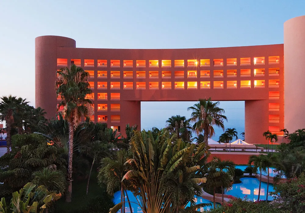 Exterior of a hotel near the beach.