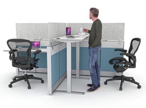 Ergonomic sit-to-stand desk with cubicle panel extenders for privacy